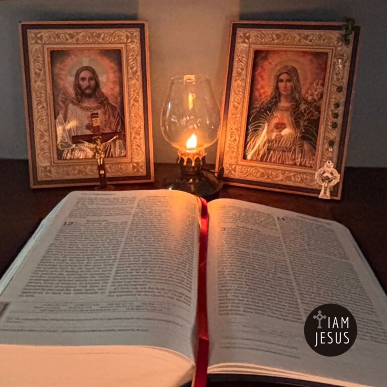 An open Bible beside a lit candle and images of Jesus and Mary, symbols of discernment and approved private revelation